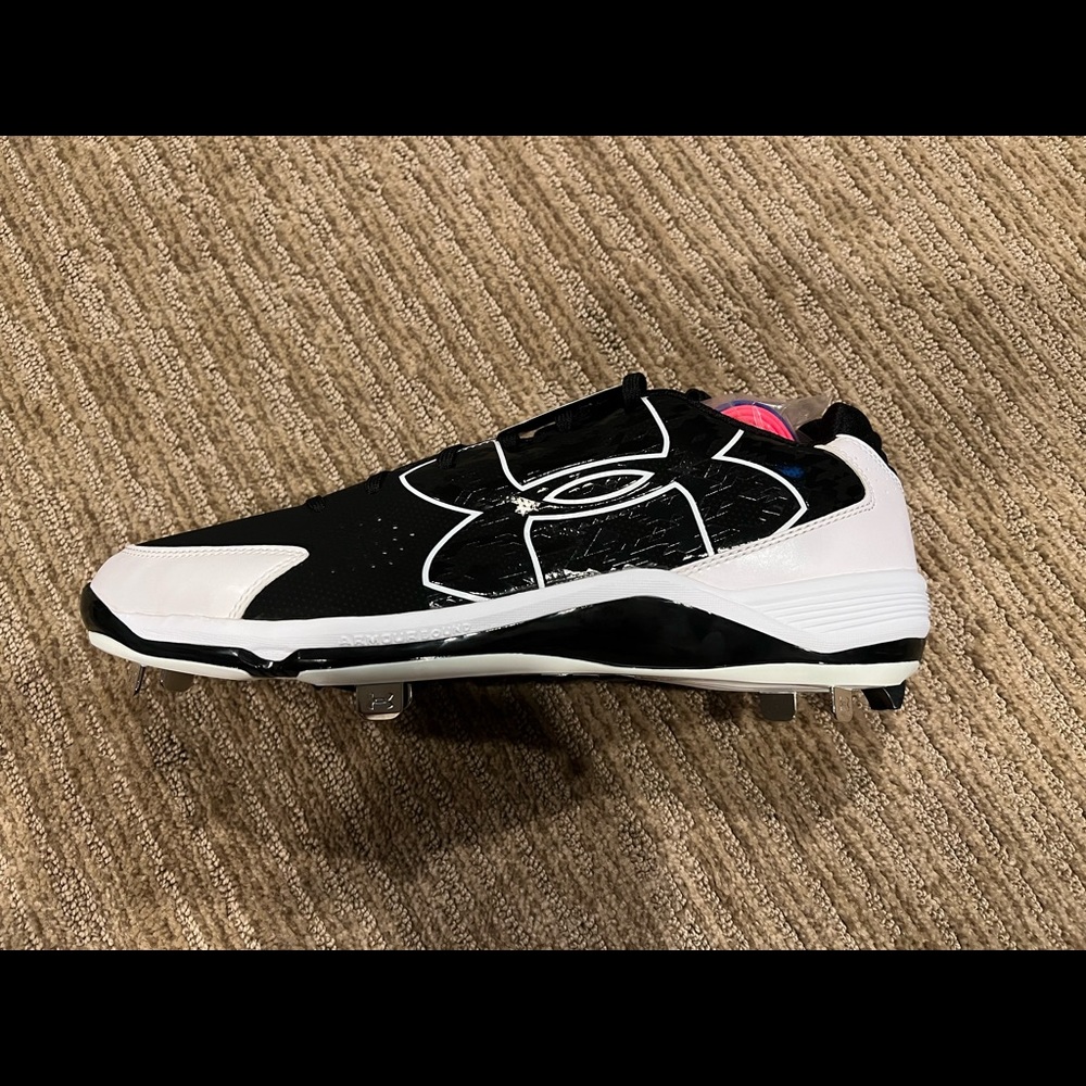 Brand new metal baseball cleats. Never worn.